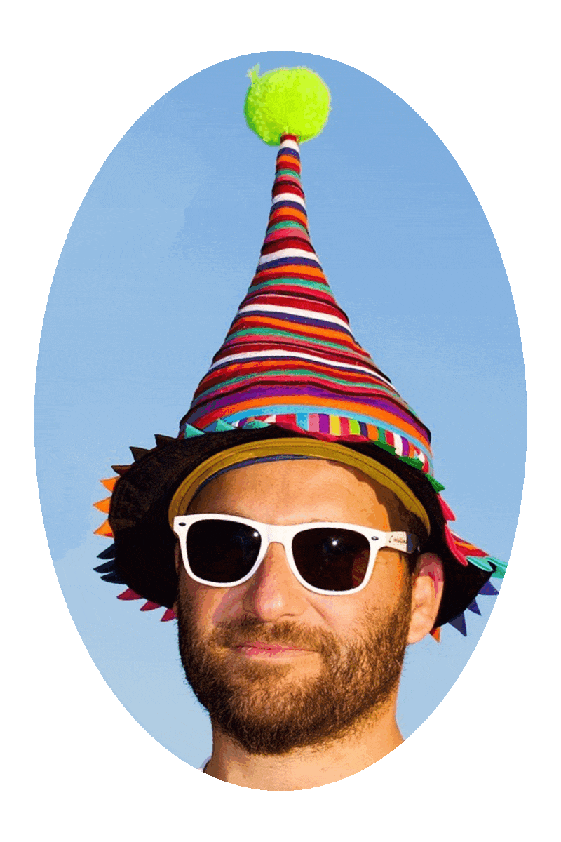 Picture of a man wearing a silly hat.
