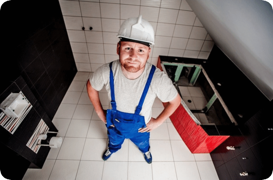 Picture of a man who works as a tile setter or tile installer, first standing with hands on hips and looking serious, then holding a level and a large tile, then smiling broadly and laughing.