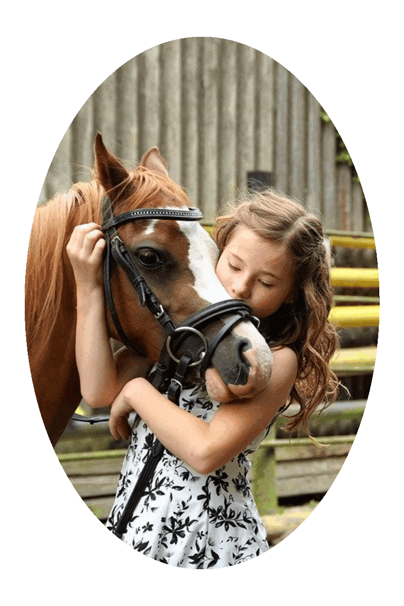 Picture of a girl and a pony.