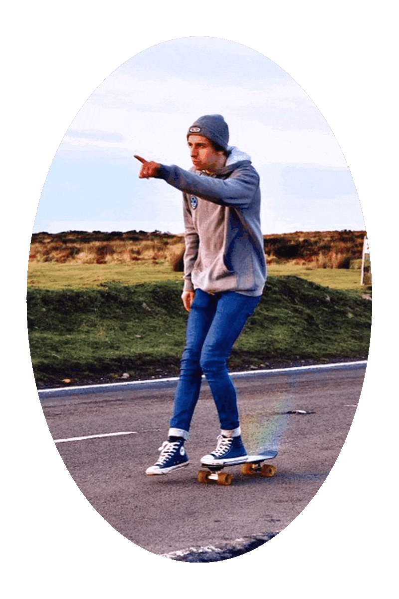 Picture of a young man riding a skateboard.