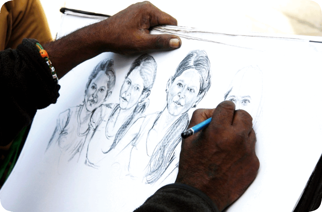 Picture of a sketch artist at work on a sketch of a woman.