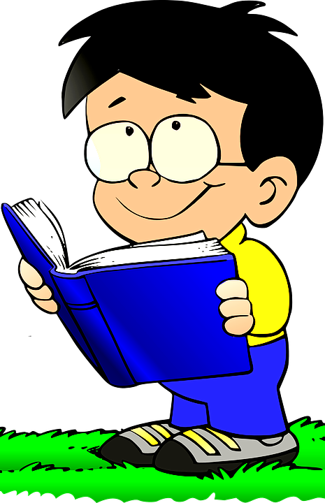 Picture of a happy smiling boy reading a book.