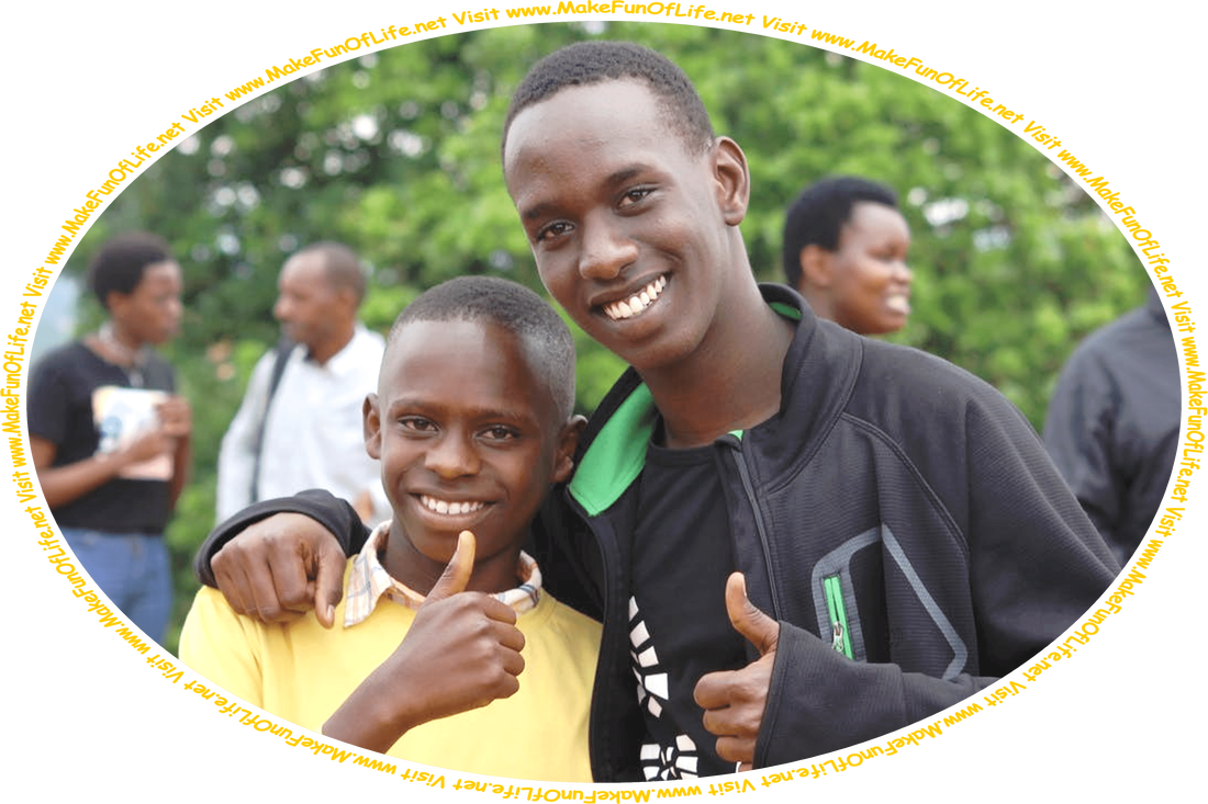 Picture of two happy smiling young men friends standing side-by-side, giving a thumbs-up hand gesture, as a family gathering is happening in the background, and the words, ‘Visit www.MakeFunOfLife.net.’