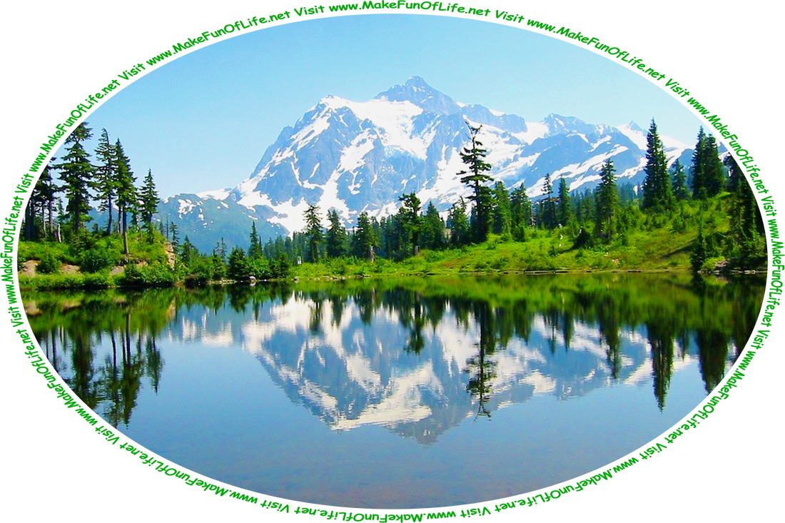Picture of a location in the state of Washington called Picture Lake, that is surrounded by green grass and evergreen trees, with Mount Shuksan in the distance and a blue sky above.