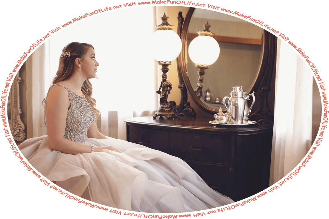 Picture of a woman in a formal gown, sitting and looking into a mirror, and the words, ‘Visit www.MakeFunOfLife.net.’