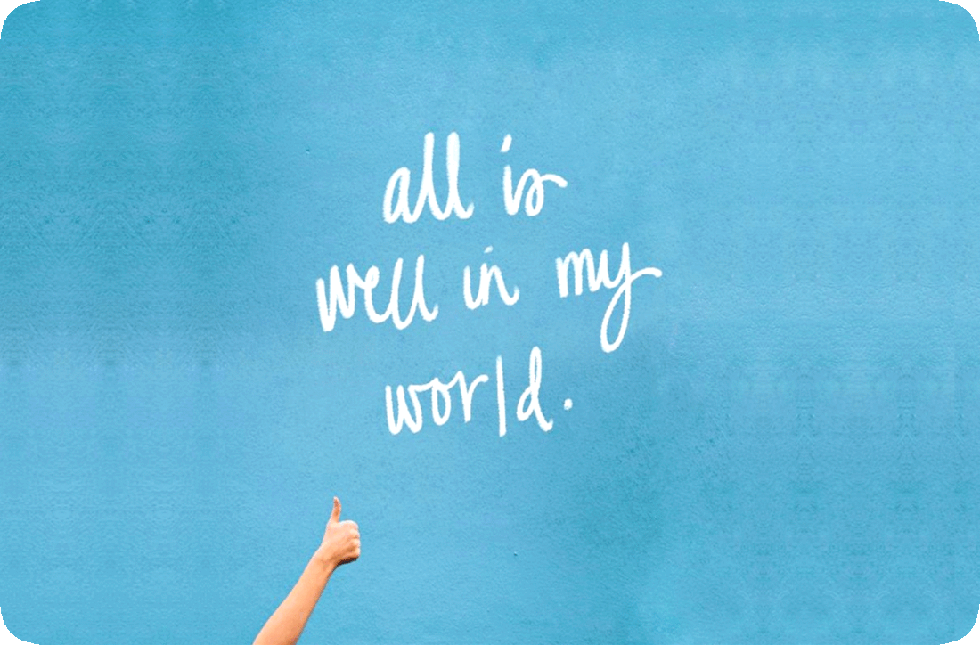 Picture of a person’s hand with a thumbs-up gesture and the words, ‘All is well in my world.’