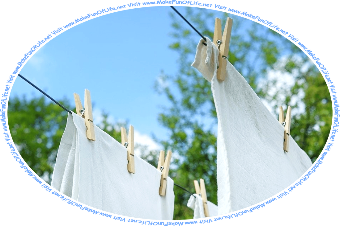 Picture of drying linens fastened to a clothesline with wooden clothespins, with the branches of green leafy trees in the background, a blue sky with fluffy white clouds above, and the words, ‘Visit www.MakeFunOfLife.net.’