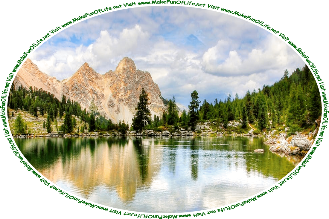 Picture of a mountain lake surrounded by evergreen trees, with a blue sky and fluffy white clouds above, and the words, ‘Visit www.MakeFunOfLife.net.’